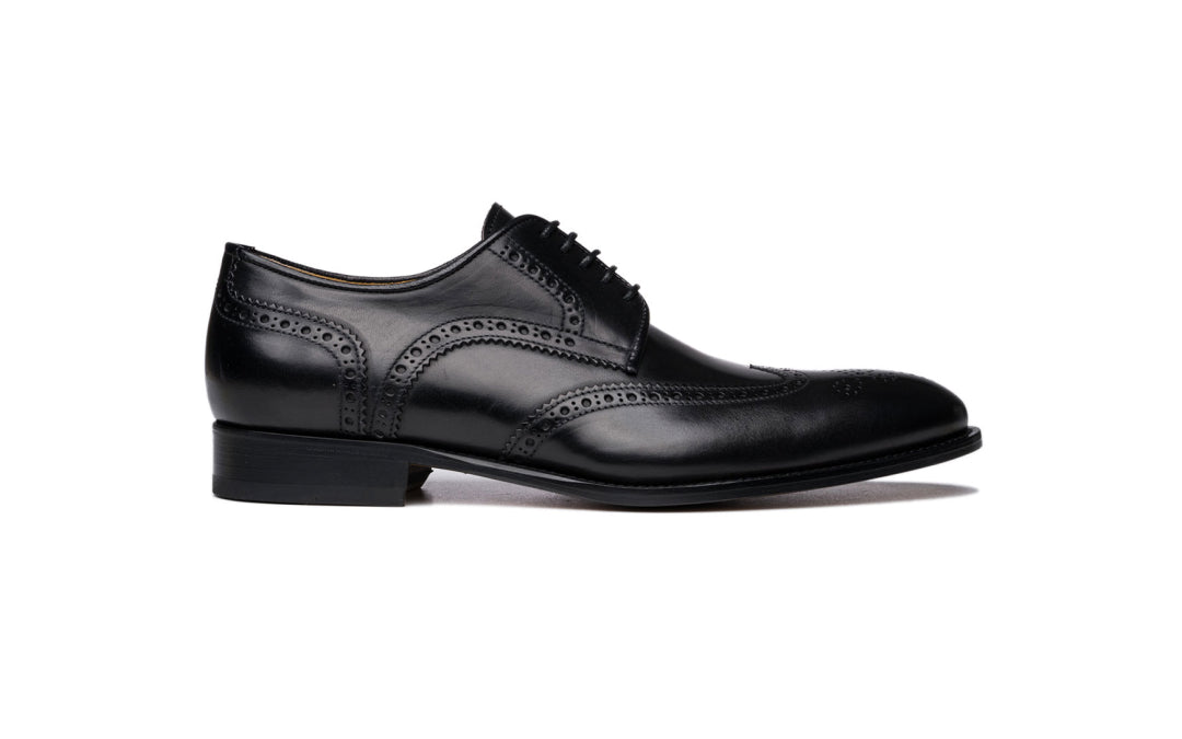 wingtip derby black dress shoe