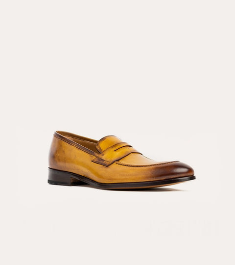 Men's golden brown Italian leather dress shoe penny loafer.