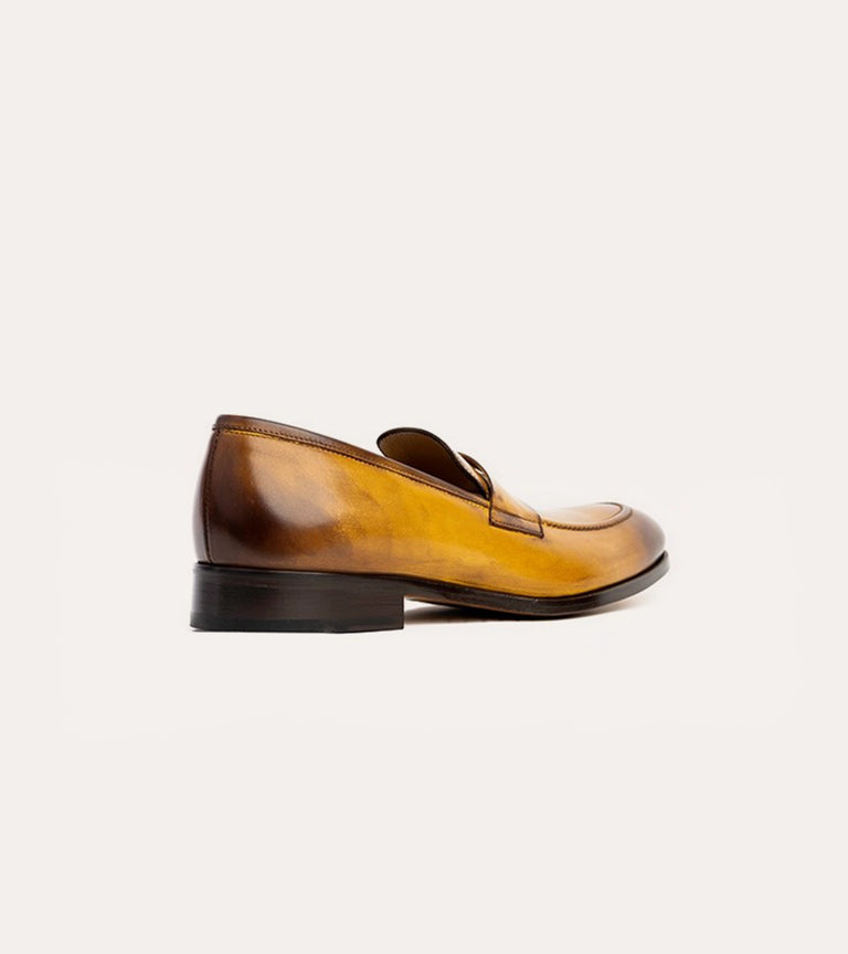 Men's golden brown Italian leather dress shoe penny loafer.