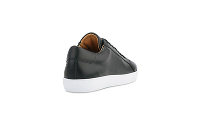 black dress sneaker with white outsole