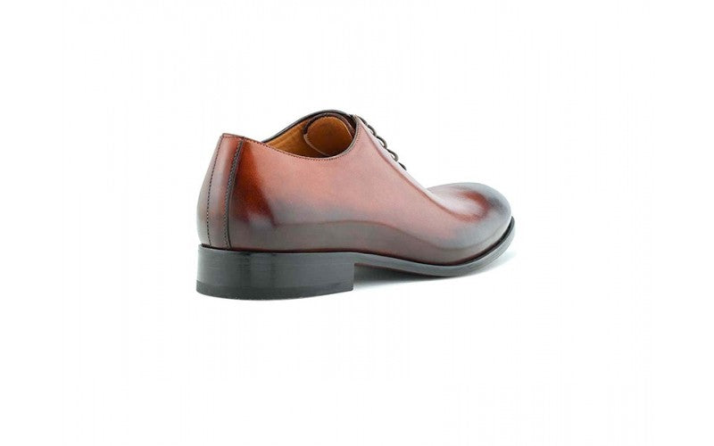 handcrafted brown dress shoe